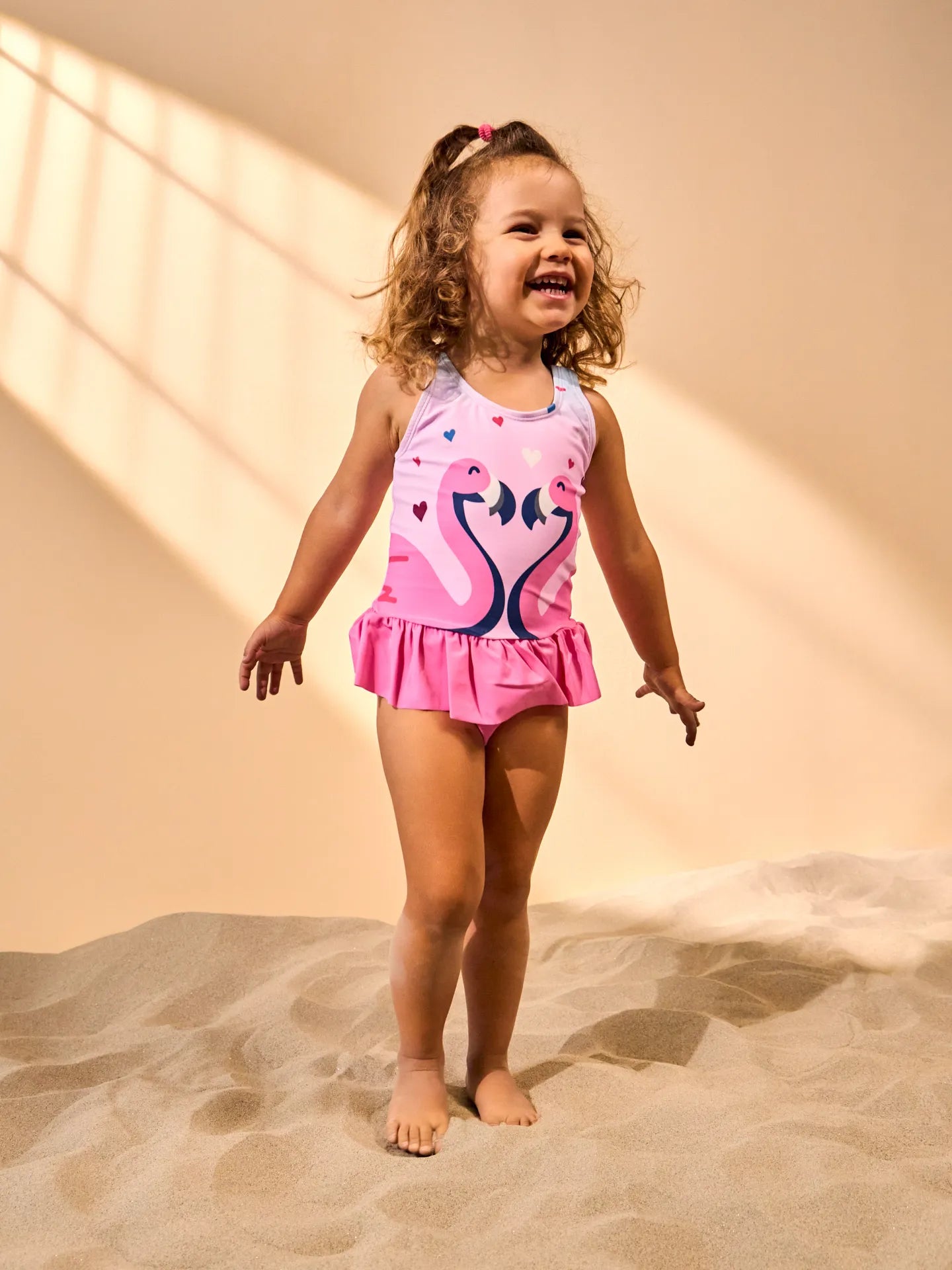girls-swimsuit-flamingos-hearts-9d/9d675ae030a95294707a9f87709d567a401db0eb